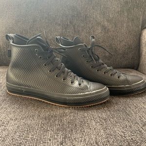 NWOT never worn WaterProof High Top Chuck Taylors